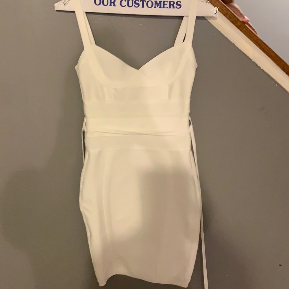 Fabulous House if CB dress, never worn because it’s too small.